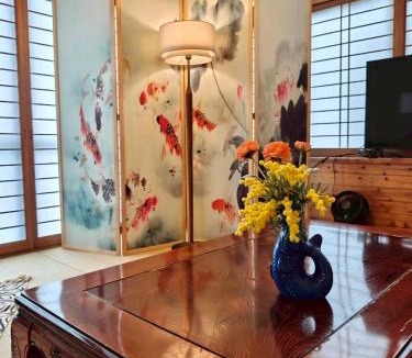 Nakama Ski Chalet | ZenAbode Onna 8 min walk to the beach BBQ in the large garden