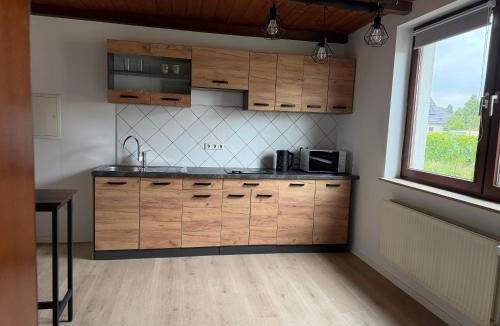 Minden Apartment | Zimmer im Erdgeschoß mit Bad und Küche