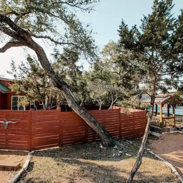 2 cabins across from each other and a shared pool!