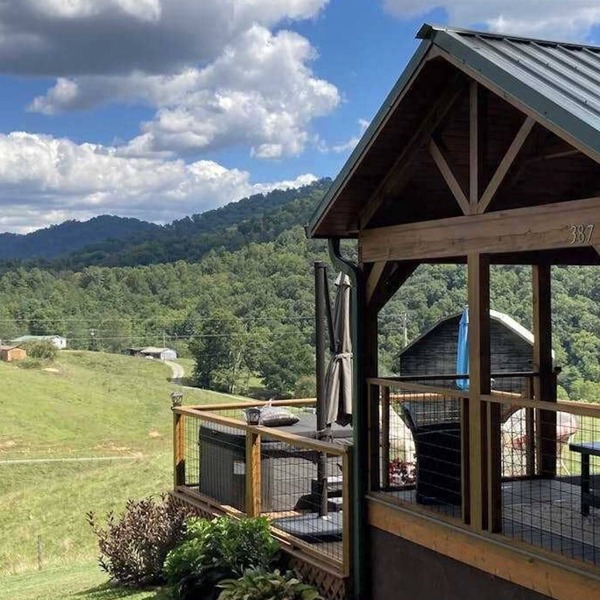2 Tiny home cabins with private hot tubs, covered porches, & amazing views