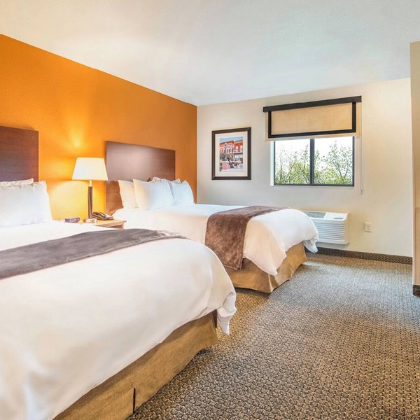 4 Modern Extended-Stay Rooms w/All Essentials for Business