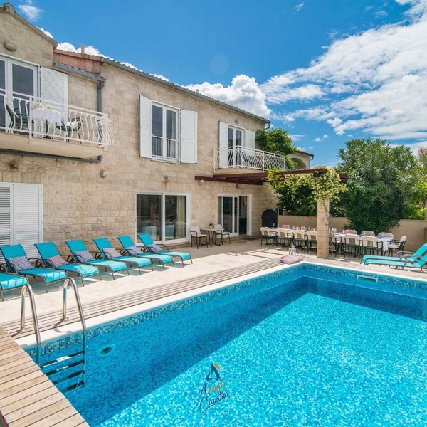 7-BR Beachfront Villa with Seaside Terrace and Heated Swimming Pool