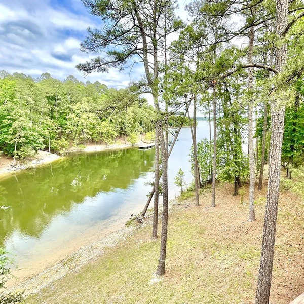 80BPD, Four bedroom, two 1/2 bath log-sided condo with lake view , garage by RedAwning