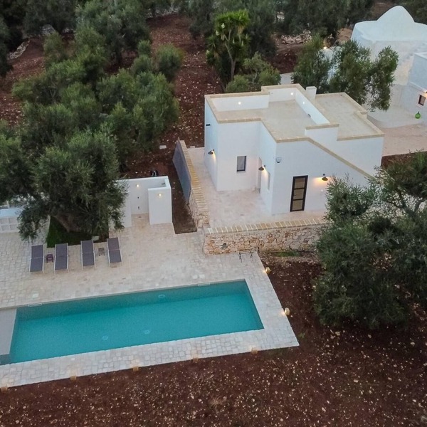 Ancient trullo with swimming pool in Ostuni. Elegant residence among the olive trees.