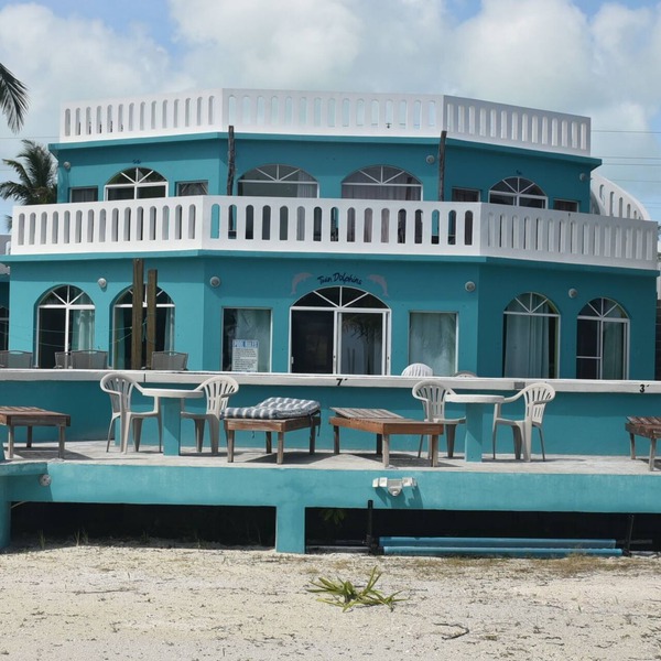 Beach front in welcoming San Pedro w/AC, pool, fitness room, WiFi, kitchenette