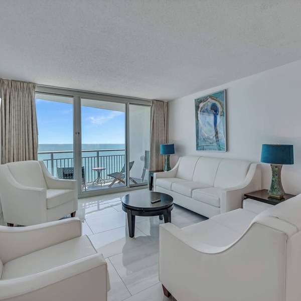 Beachfront condo with balcony & resort pools