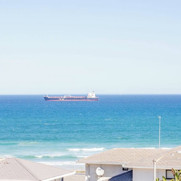 Beachfront couples paradise overlooking Robben Island and Atlantic ocean.