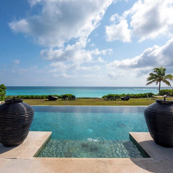 Beachfront Estate w/Htd Pool, Prime Banks Rd Location. Walk to Tippys!