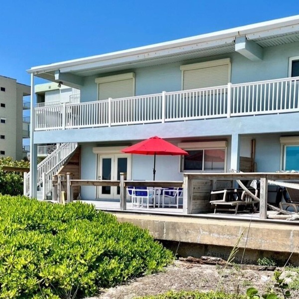 Beachfront ground floor condo with deck and heated pool