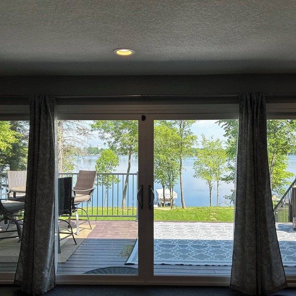 Beautiful deck overlooking Maple Lake with private, shared dock.