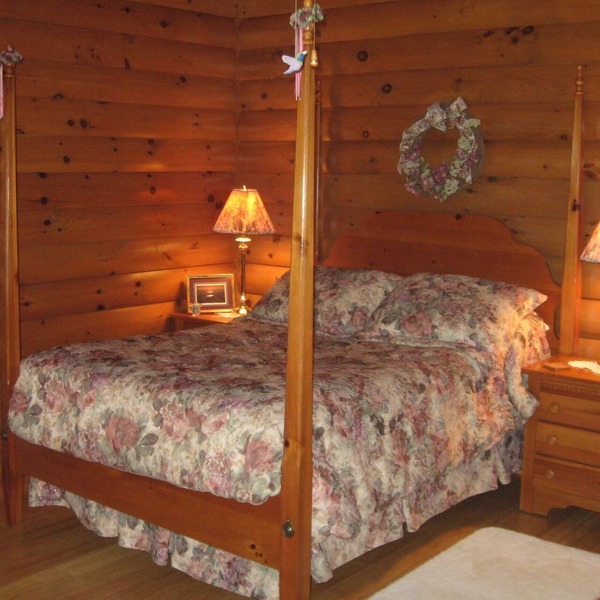 Beautiful log sided, on Owasco Lake w/private beach, entrance and parking.