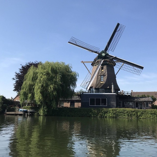 Beautiful original windmill along the riverside