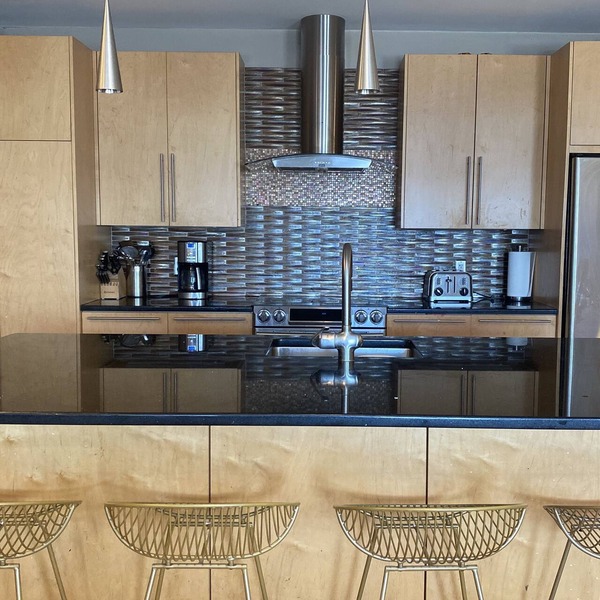Boston Harbor views. Modern north end condo.FREE PARKING!