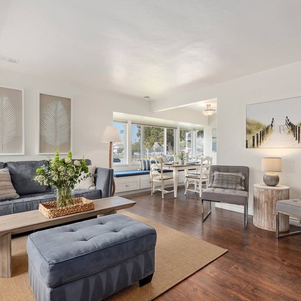 Bright and Airy Coastal Condo Just a Half Block Away From East Beach!