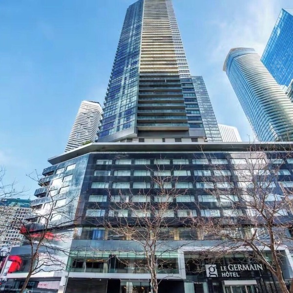 Bright condo on 39th floor with skyline views from large balcony