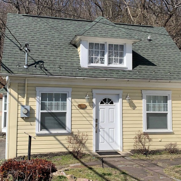 Brookside Cottage is a beautiful open concept doll house stay for two.