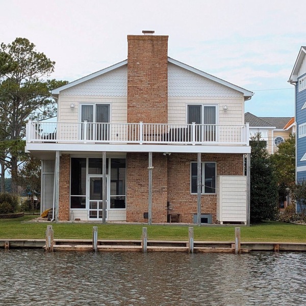 Canalfront Retreat w/Dock, Kayaks & Screened Porch – Pet-Friendly!