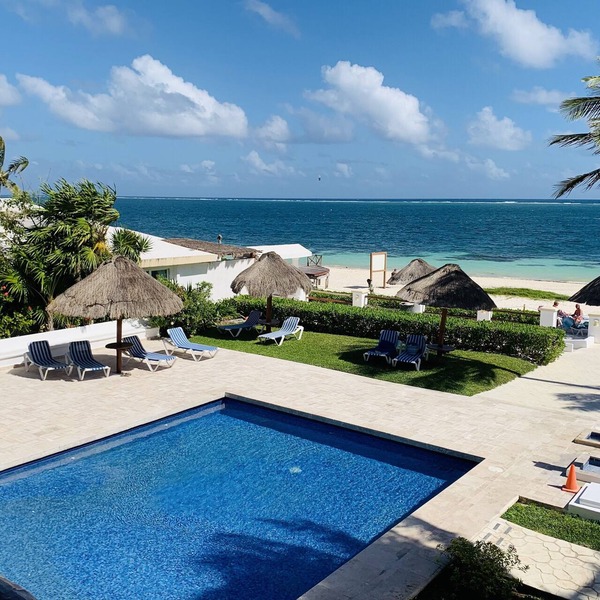 Casita Blanca gem overlooking a gorgeous pool and the Caribbean Sea!