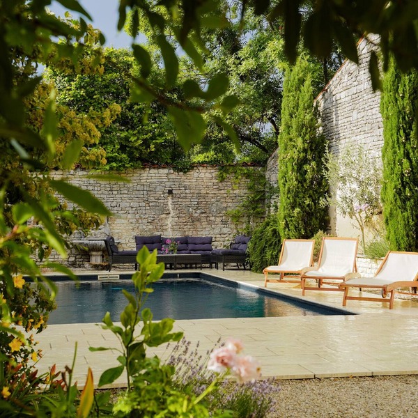 Character house with a pool in the middle of a historic village