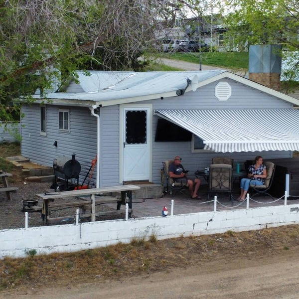 Charming 2 bedroom waterfront cabin at West Magic Id. 83352 with hot tub.
