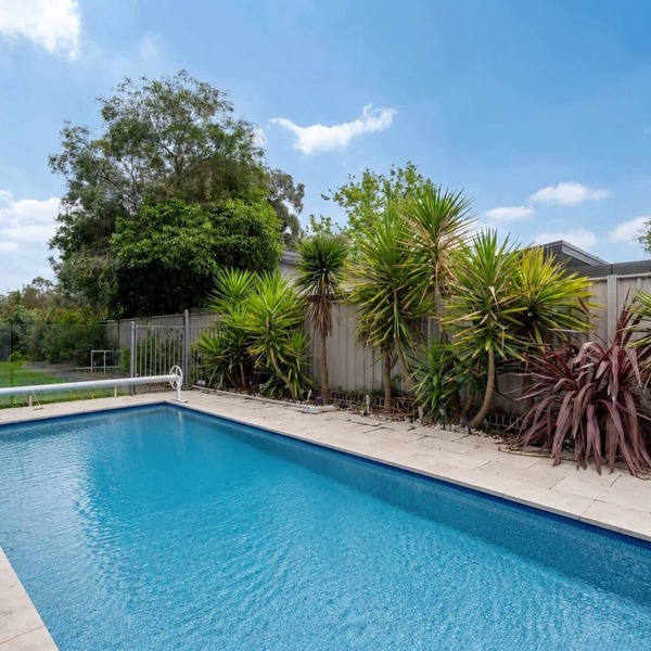 Charming 4-Bed Getaway with Pool & Garden Oasis