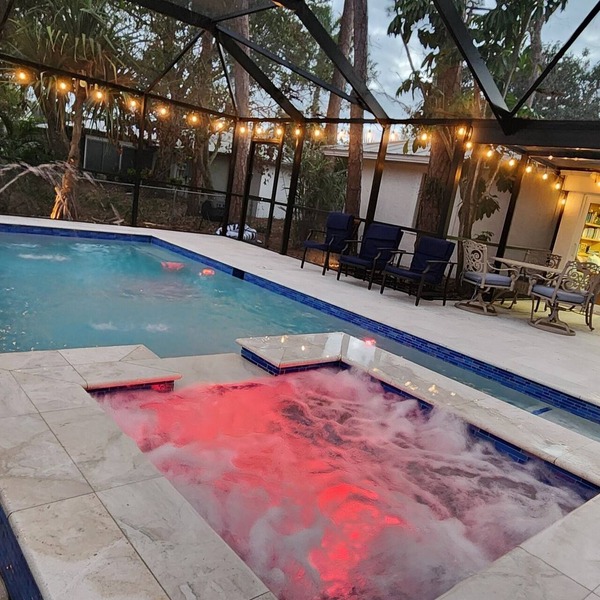 Charming 4-bedroom plus den villa with pool and spa near the beach and downtown.