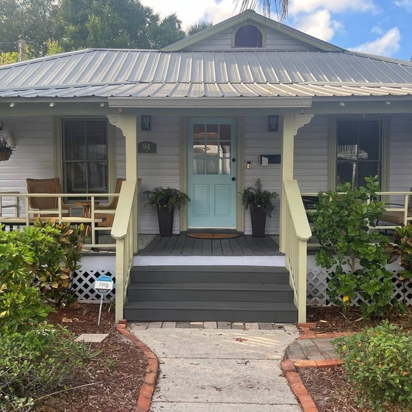 "Charming Cottage with Spacious Porch, Walking Distance to Top Attractions!"
