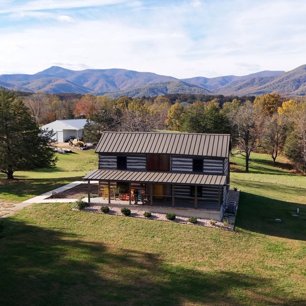 Charming, fully renovated 19th century cabin with spectacular views. 4 BR, 2 BA.