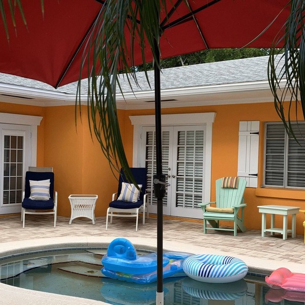 Charming one floor, 2-bedroom house steps to the beach, private heated pool