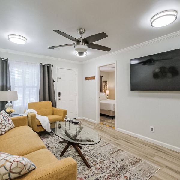 Charming private home sleeps 6 in the Heights near Downtown with fast WiFi, smart TVs, ample parking, and a primary king bed for a comfortable stay.