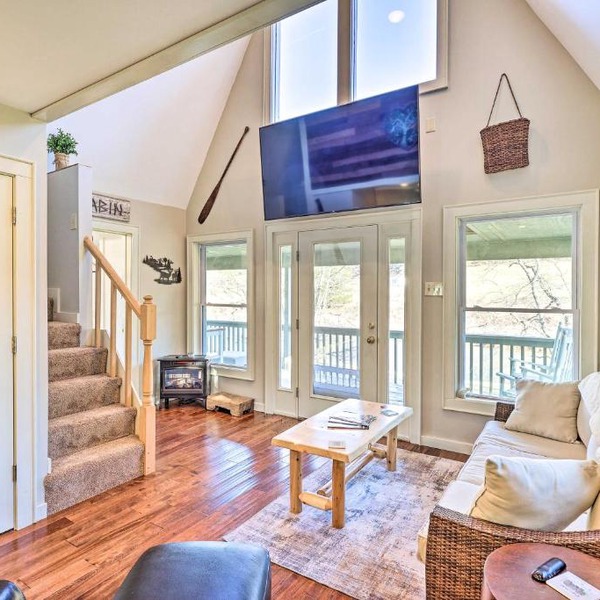 Charming Riverfront Cabin with Yard and Porch!