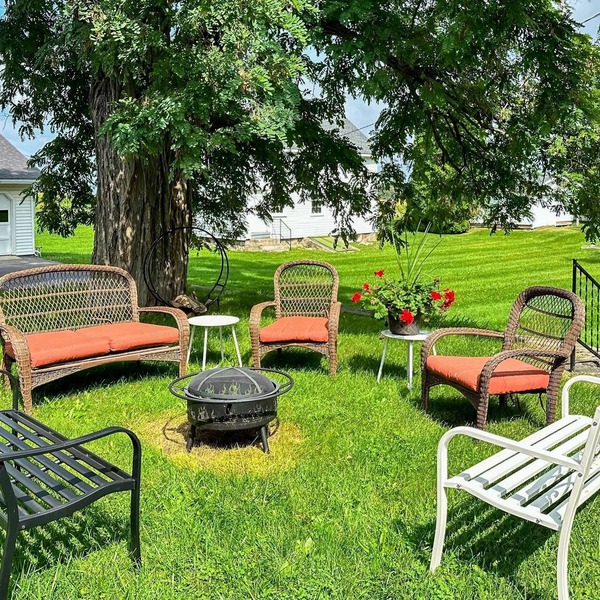 Classic country retreat with a game room, bar, expansive outdoor space, & grill