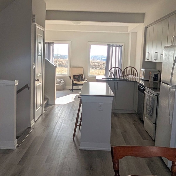 Clean, spacious 3 bedroom townhouse. Family friendly, relaxing stay free Wifi.