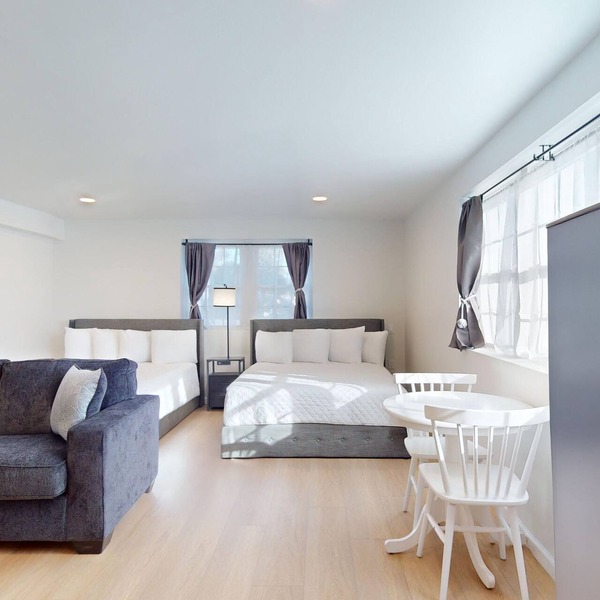 Comfortable Coastal Retreat with Two Queen Beds & Sleeper Sofa - Suite Room