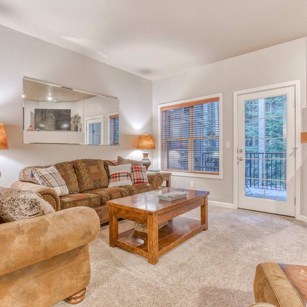 Comfortable condo with fireplace, heated pool, hot tub, balcony & full kitchen