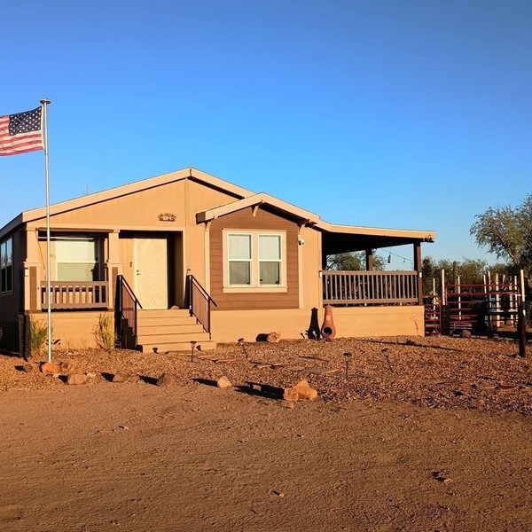 Comfortable two-bedroom house only 30 minutes from downtown with horse stalls.