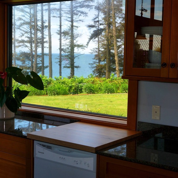 Contemporary Oceanfront Cottage with Private Beaches, Trails, and Gardens