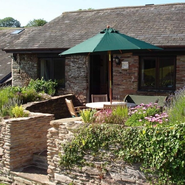 Converted barn. Shared pool, tennis, snooker, games, golf, grounds. South Devon