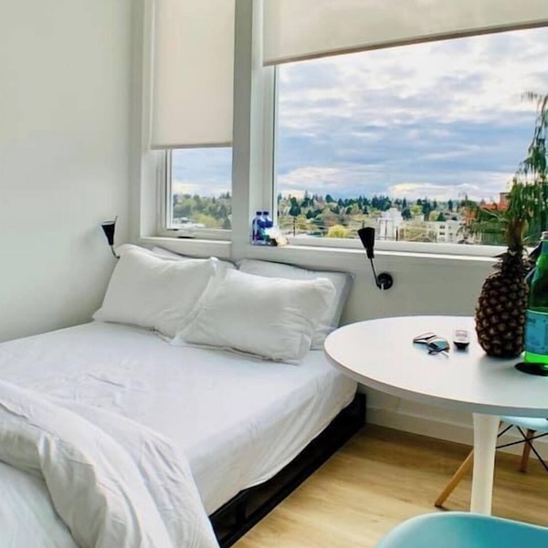 Corner unit studio with natural light and premium amenities for a very comfortable quick stay.