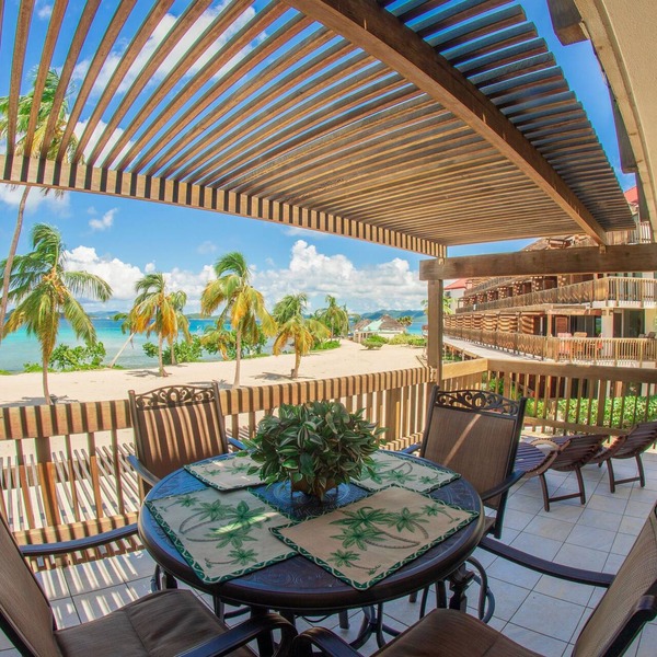 Corner unit with unobstructed views of Sapphire Beach which is steps away.