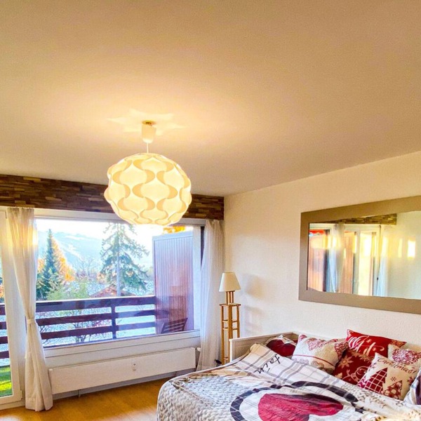 Cosy, quiet studio with terrace overlooking the Alps