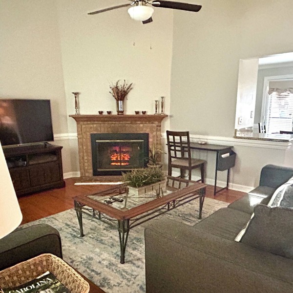Cozy one level, 2 BR, 2 Bath TH in charming wooded community. Perfect location!