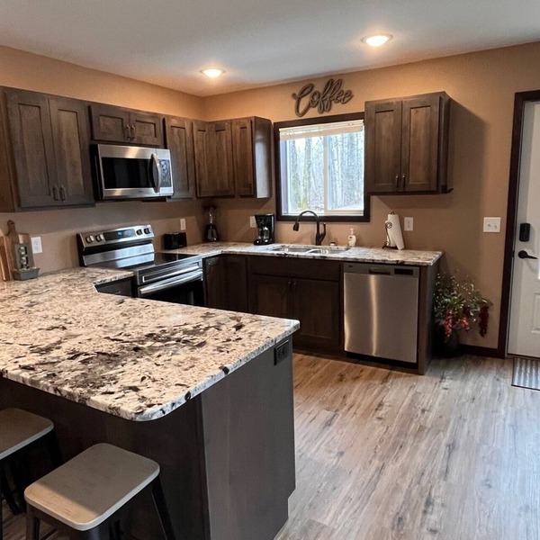 Cozy two level home - 2 minutes from beach on private wooded lot.