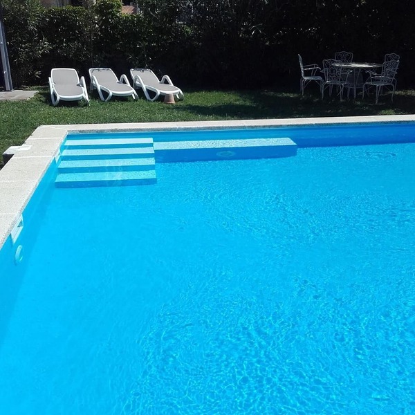 Detached house with a large garden and a huge pool