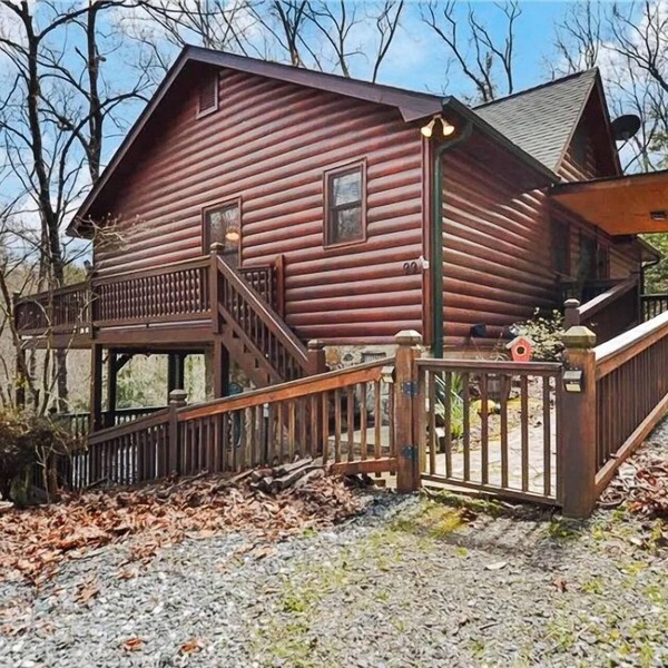Discover tranquility at Hidden Oasis, a charming home nestled in serene Cherry Log Mountain