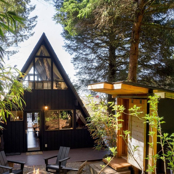 Dog-friendly A-frame with hot tub, fireplace, grill, & firepit - walk to beach