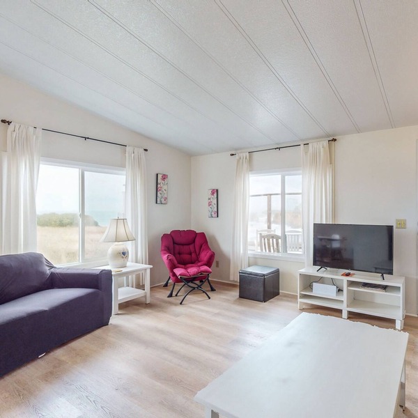 Dog-friendly home with private beach access, hot tub & stunning views