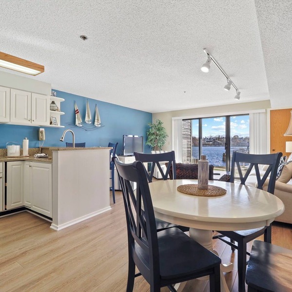 Edgewater Inn Condo #117D with Waterfront Access | Pool, Hot Tub, Sauna