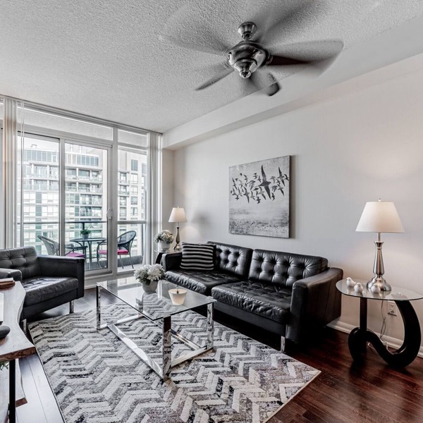 Elegant Downtown Oasis with City and Lake Views Plus Parking!