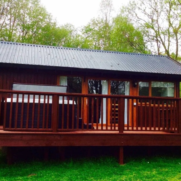 Elevated Loch View Cabin with WiFi, Electric Hot Tub and Mountain Views